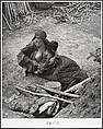 After the bombardments, this mother is one of many who keep alive by eating herbs and roots, Taiherhchwang, Robert Capa  American, born Hungary, Gelatin silver print