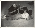 Mending, Coney Island, Weegee American, born Austria-Hungary, Gelatin silver print