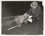 Tramp on Lower East Side Hit by a Taxi, Weegee American, born Austria-Hungary, Gelatin silver print