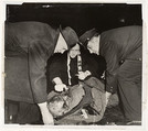 Tramp on Lower East Side Receiving the Last Rites, Weegee American, born Austria-Hungary, Gelatin silver print