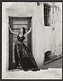 [Woman in Long Dress, Standing in Doorway of Stuccoed Building], George Platt Lynes  American, Gelatin silver print