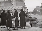 [Spanish Women in Street with Sacks and Boxes], Robert Capa  American, born Hungary, Gelatin silver print