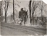 Helping a Wounded . . ., Robert Capa  American, born Hungary, Gelatin silver print