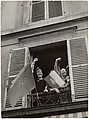 [Women Giving Popular Front Salute from Window, Bastille Day, Paris], Robert Capa  American, born Hungary, Gelatin silver print