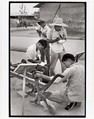 Visitors take notes on a peasant invention at National Farm Implements Exhibit, Peking, Henri Cartier-Bresson  French, Gelatin silver print