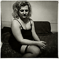 Transvestite with a torn stocking, N.Y.C., Diane Arbus American, Gelatin silver print