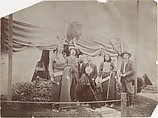 [William F. "Buffalo Bill" Cody, Rosa Bonheur, Chief Rocky Bear, Chief Red Shirt, William "Broncho Bill" Irving, Roland Knoedler, and [Benjamin?] Tedesco in front of Cody's Tent at the Paris Exposition Universelle], Unknown, Gelatin silver print