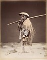 Farm laborer with rain coat (mino), Suzuki Shin'ichi  Japanese, Albumen silver print from glass negative with applied color