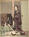 [Japanese Woman in Traditional Dress Posing with Cat and Instrument], Suzuki Shin'ichi  Japanese, Albumen silver print from glass negative with applied color