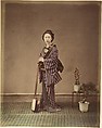 [Japanese Woman in Traditional Dress Posing with Instrument], Unknown, Albumen silver print from glass negative with applied color