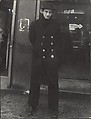 [Street Scene: Man Dark, Double-Breasted Overcoat, New York City], Leon Levinstein  American, Gelatin silver print