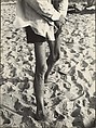 [Beach Scene: Man with Light Shirt and Dark Shorts, Coney Island, New York], Leon Levinstein  American, Gelatin silver print