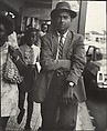 [Man in Sport Coat, Striped Tie, and Fedora, on Sidewalk, New York?], Leon Levinstein  American, Gelatin silver print