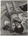 [Beach Scene: Woman in Bikini Cuddling Baby, Coney Island, New York], Leon Levinstein (American, Buckhannon, West Virginia 1910–1988 New York), Gelatin silver print