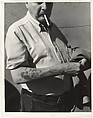 [Man in Short Sleeve Shirt with Tattoo of Female Nude on Forearm, New York City], Leon Levinstein (American, Buckhannon, West Virginia 1910–1988 New York), Gelatin silver print