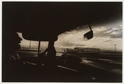 [Laughing Driver Seen from Passenger's Seat of Car], Garry Winogrand  American, Gelatin silver print