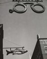 [Street Signs in Forms of Eyeglasses and Fish], André Kertész  American, born Hungary, Gelatin silver print