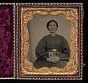 [Woman Holding Cased Portraits of Civil War Soldiers], Unknown, Tintype