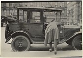 [Person Leaning into Yellow Taxi], James Van Der Zee  American, Gelatin silver print