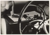 Meret Oppenheim at the Printing Wheel, Man Ray  American, Gelatin silver print