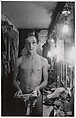Female impersonator holding long gloves, Hempstead, L.I., Diane Arbus American, Gelatin silver print