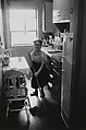 Miss Makrina, a Russian midget, in her kitchen, N.Y.C., Diane Arbus American, Gelatin silver print