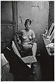Stripper with bare breasts sitting in her dressing room, Atlantic City, N.J., Diane Arbus American, Gelatin silver print