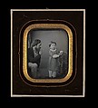 [Man Calming a Young Boy Posing before the Camera], Unknown (French), Daguerreotype