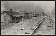 [Shacks and Railroad Tracks in Vanetta], Nancy Naumburg  American, Gelatin silver print