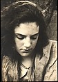 [Carol Kalker with Downward Gaze, Greenwich, Connecticut], Walker Evans  American, Gelatin silver print on postcard stock