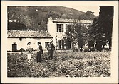 [Lucien Jacques, Georgette Maury, and Léon Berthier Standing in Garden in Front of French Country-Style House, Cyprés de St. Jean par Grasse, France], Walker Evans  American, Gelatin silver print