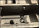 [Jane Ninas and Christine Fairchild on Balcony, Belle Grove Plantation House, White Castle, Louisiana], Walker Evans  American, Gelatin silver print