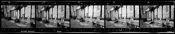 [Five 35mm Film Frames: View Down Street in Hell's Kitchen with Children on Stoop and Torn Circus Posters, New York City], Walker Evans (American, St. Louis, Missouri 1903–1975 New Haven, Connecticut), Film negative