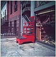 [Sidewalk Shoeshine Chair, 347 East 86th Street, New York City], Walker Evans  American, Dye transfer print