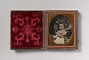 [Smiling, Nude Baby Holding Foot, Seated on Furniture Draped with Floral Print Fabric], Unknown (American), Daguerreotype with applied color
