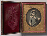 [Child Wearing Straw Hat, Arm Resting on Table], Unknown (American), Daguerreotype with applied color