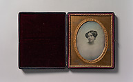 [Young Woman with Hair Styled in Two Buns], Southworth and Hawes (American, active 1843–1863), Daguerreotype with applied color