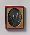 [Two Young Men in Bow Ties, One Seated Holding a Book, One Standing], Robert Boning (British, 1826–1878), Daguerreotype with applied color