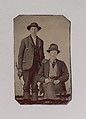 [Two Young Men, One Seated and One Standing, Holding Carpentry Tools], Unknown (American), Tintype with applied color