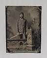 [Carpenter, Standing Behind a Decorative Balustrade, Holding a Square], Unknown (American), Tintype with applied color