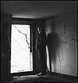 [Guy Davenport and Unidentified Woman in Darkened Room, Looking Through Doorway], Ralph Eugene Meatyard  American, Gelatin silver print