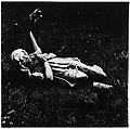 [Praying Female Statuette on Ground Next to Mannequin Arm and Doll Head], Ralph Eugene Meatyard  American, Gelatin silver print