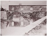 [Canal and Ruins of Richmond and Danville Railroad Depot, Richmond, Virginia], Alexander Gardner  American, Scottish, Albumen silver print from glass negative