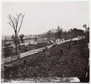 [White picket fence with buildings in background].  Brady album, p. 123, Unknown (American), Albumen silver print from glass negative