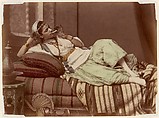 [Reclining Woman Smoking], Unknown, Albumen silver print from glass negative with applied color