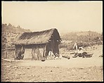 [Family Seated by Thatched Hut, South America], Unknown, Salted paper print from glass negative