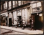 Shop front of "Courone d'or," Quai Bourbon, Eugène Atget French, Gelatin silver print from glass negative