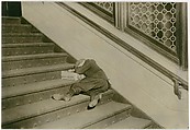 Newsboy asleep on stairs with papers, Jersey City, New Jersey, Lewis Hine  American, Gelatin silver print