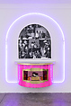 Photo Bar, Sadie Barnette American, Inkjet print with rhinestones in arched frame, neon, plywood, holographic vinyl upholstery, glitter, plexiglass, glass crystals, 8-track player, and vintage headphones