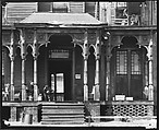 [Boarding House with Two Men Seated on Porch, Birmingham, Alabama], Walker Evans  American, Film negative